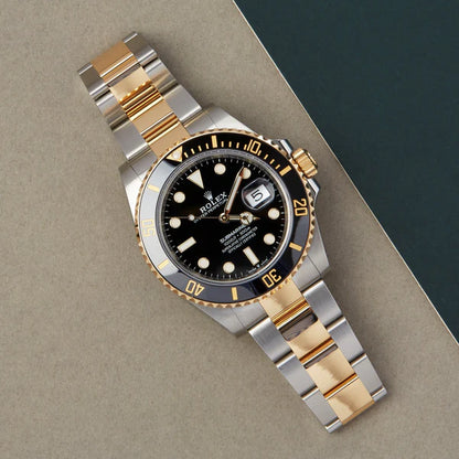 ROLEX SUBMARINER BLACK AND GOLD